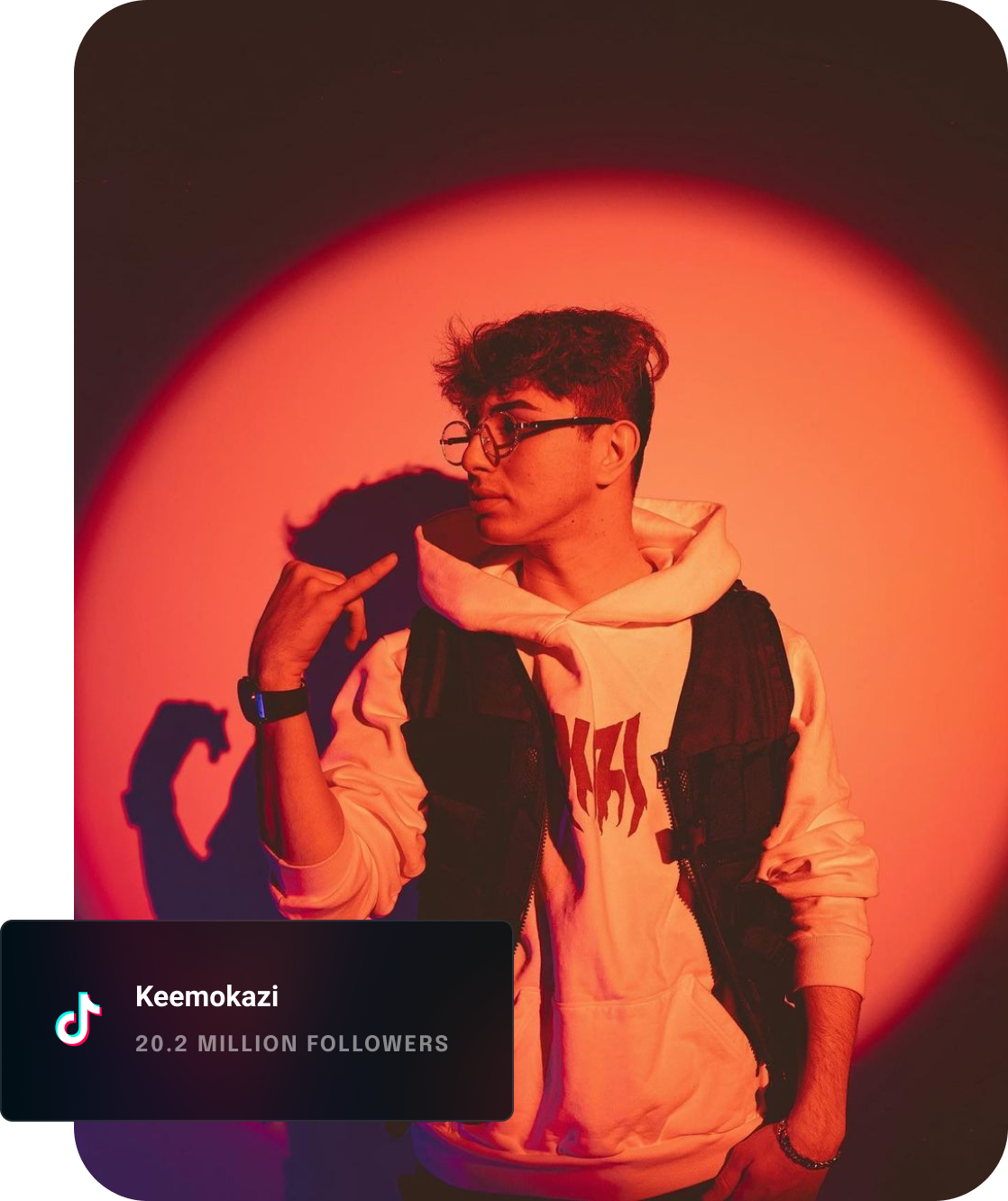 TikTok influencer looking away from the camera and vibing. 